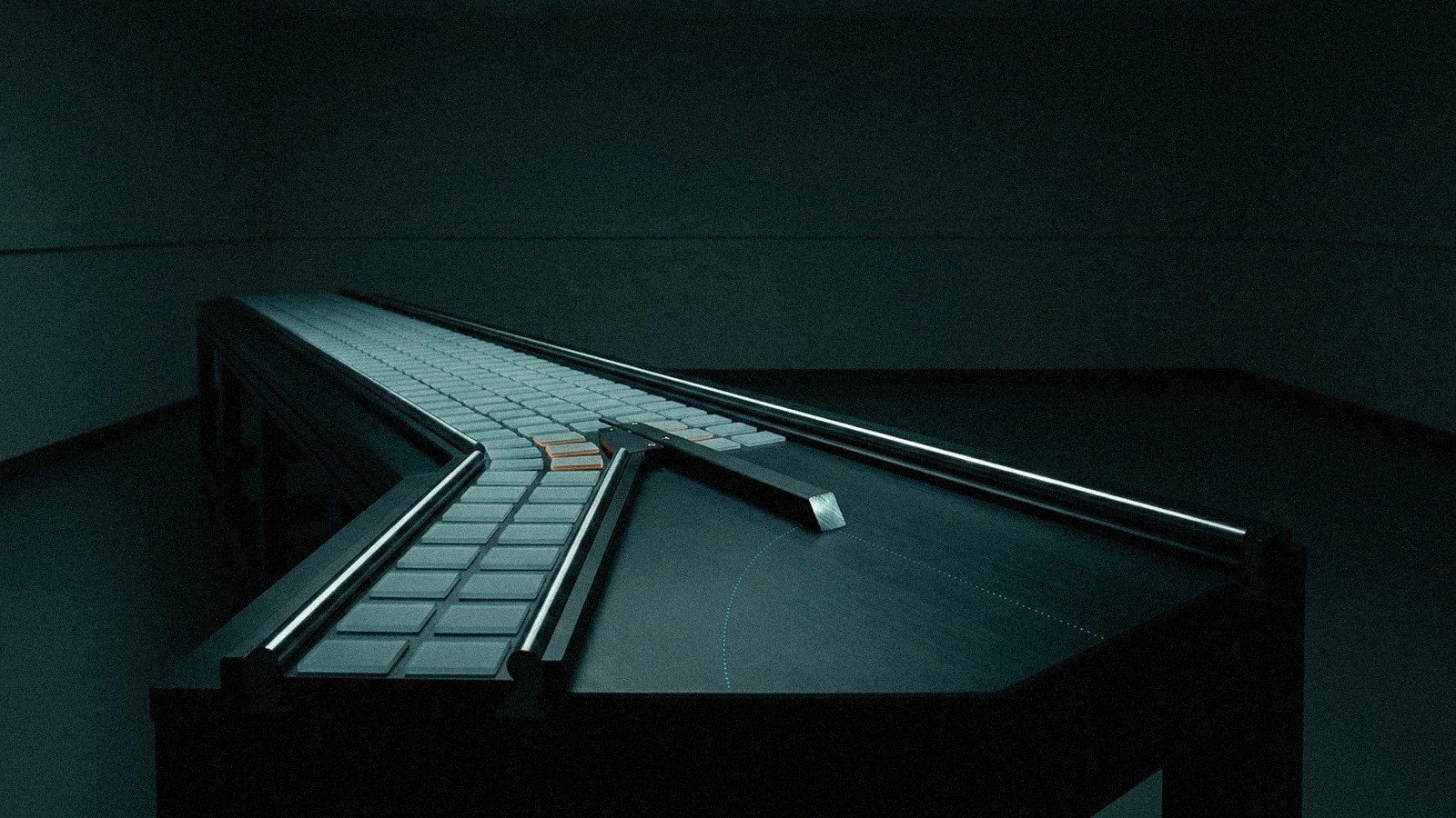 A dark conveyor line where a mechanical diverter splits a stream of pale grey tiles, pulling a small group of amber-edged ones onto a side branch that ends over empty deck.